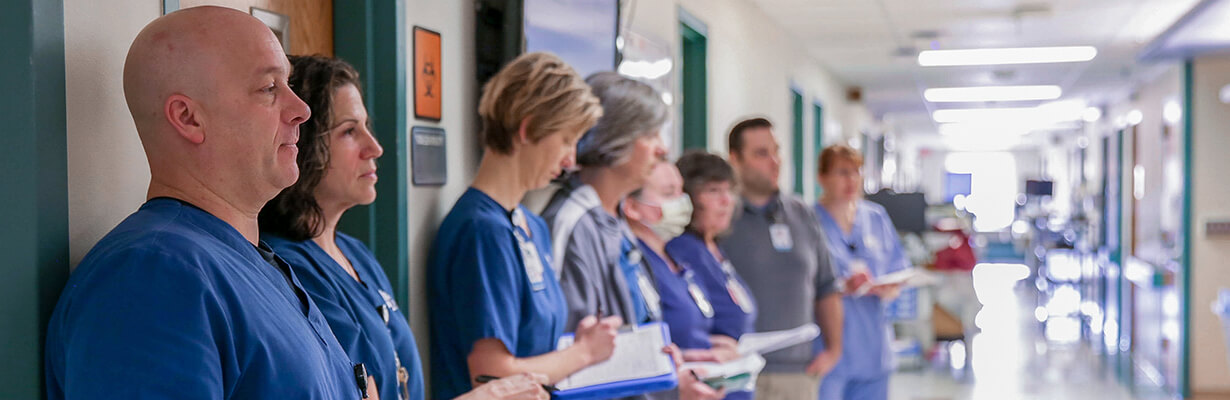 Medical team gathered together in a hospital corridor